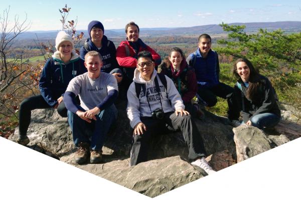 Group of smiling students on a hike